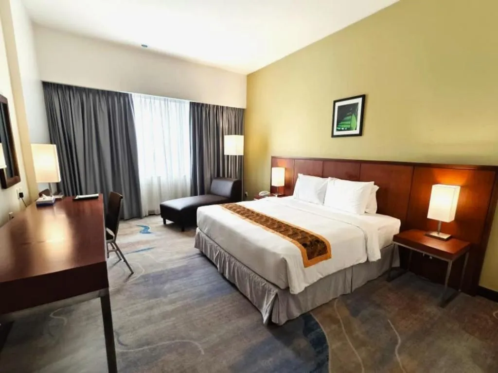 Bed in RH Hotel Sibu