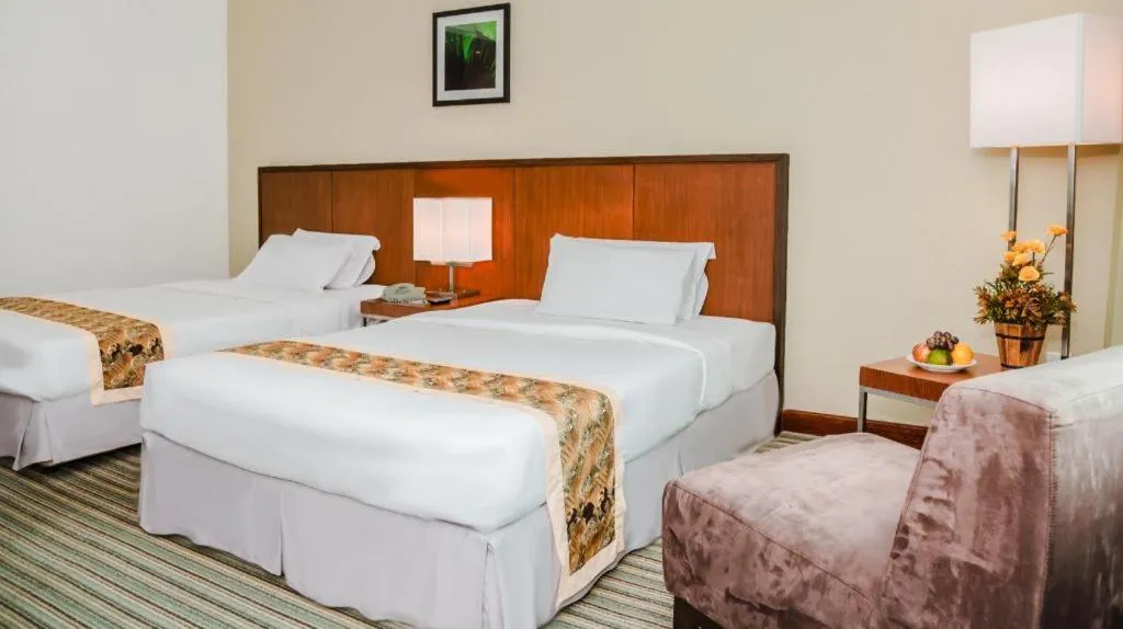 Bed in RH Hotel Sibu