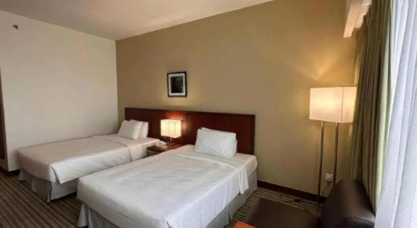 Bed in RH Hotel Sibu