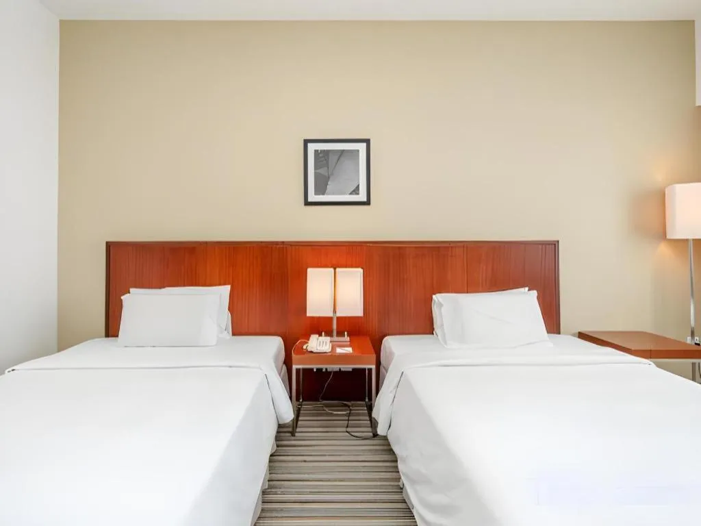 Bed in RH Hotel Sibu