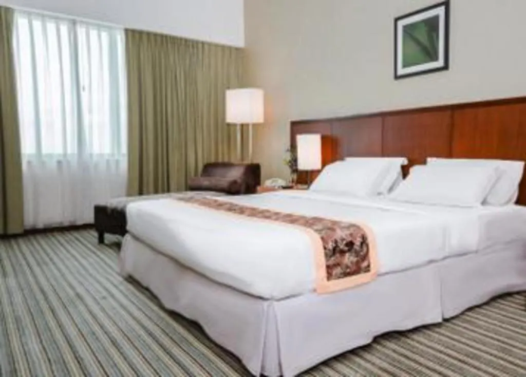 Bed in RH Hotel Sibu