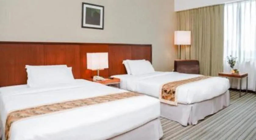 Bed in RH Hotel Sibu