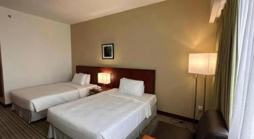 Bed in RH Hotel Sibu