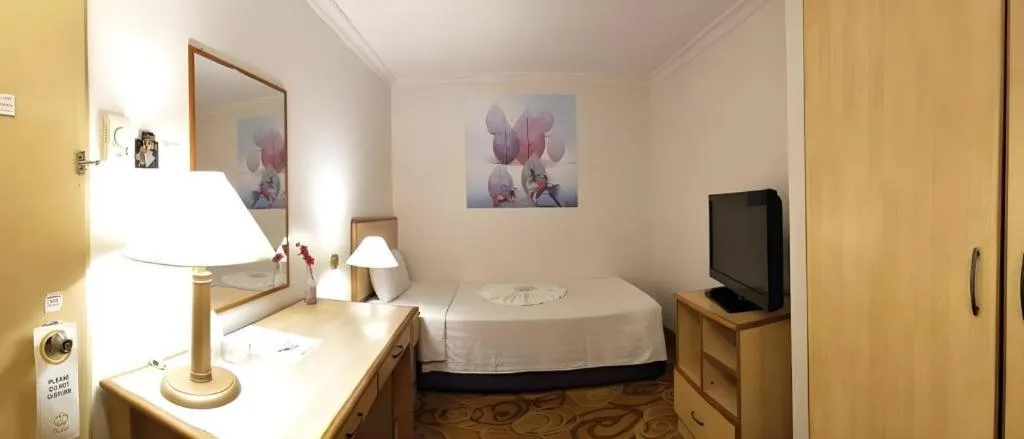 Bed in The Orchid Hotel