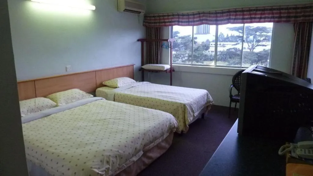 Bed in Hotel Hung Hung