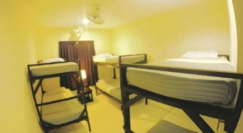 Bed in Perhentian Tivoli Inn