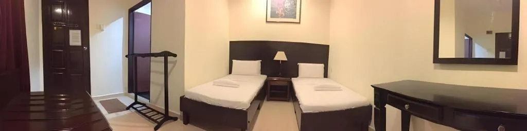 Bed in Perhentian Tivoli Inn