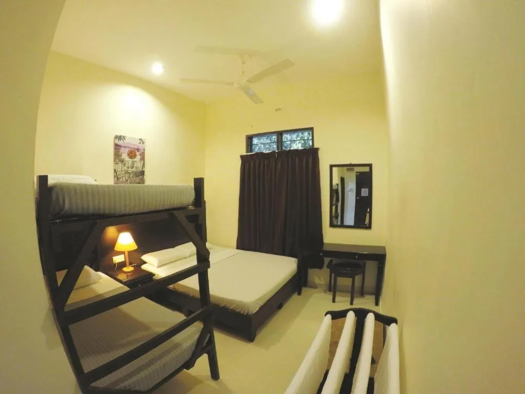 Bed in Perhentian Tivoli Inn