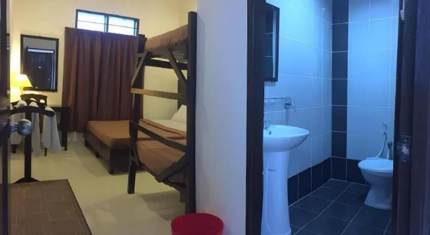 Bed in Perhentian Tivoli Inn