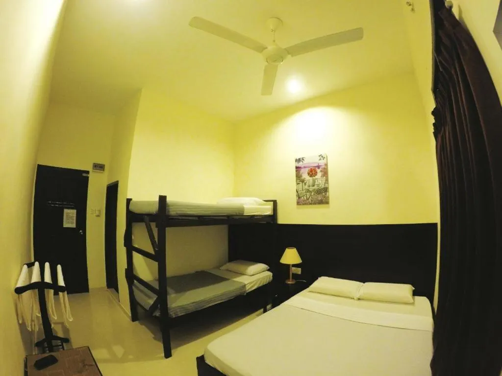 Bed in Perhentian Tivoli Inn