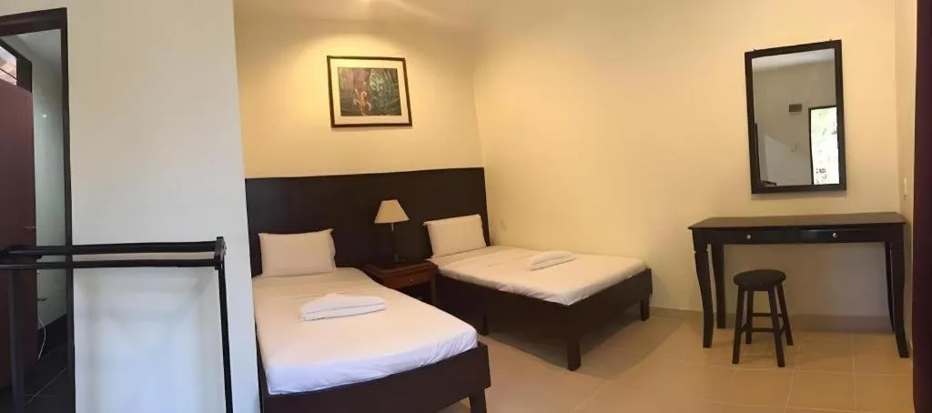 Bed in Perhentian Tivoli Inn