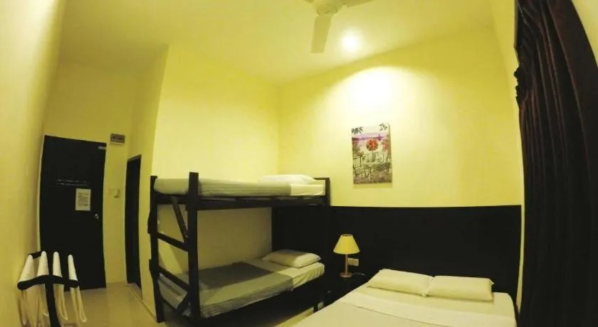 Bed in Perhentian Tivoli Inn