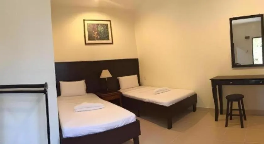 Bed in Perhentian Tivoli Inn