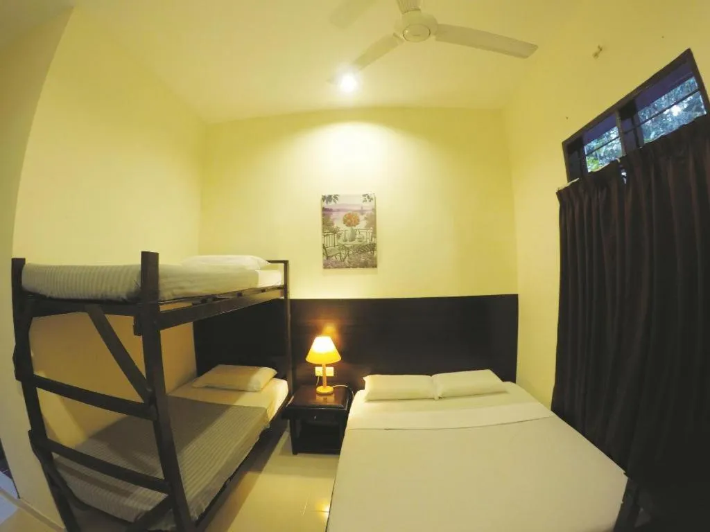 Bed in Perhentian Tivoli Inn