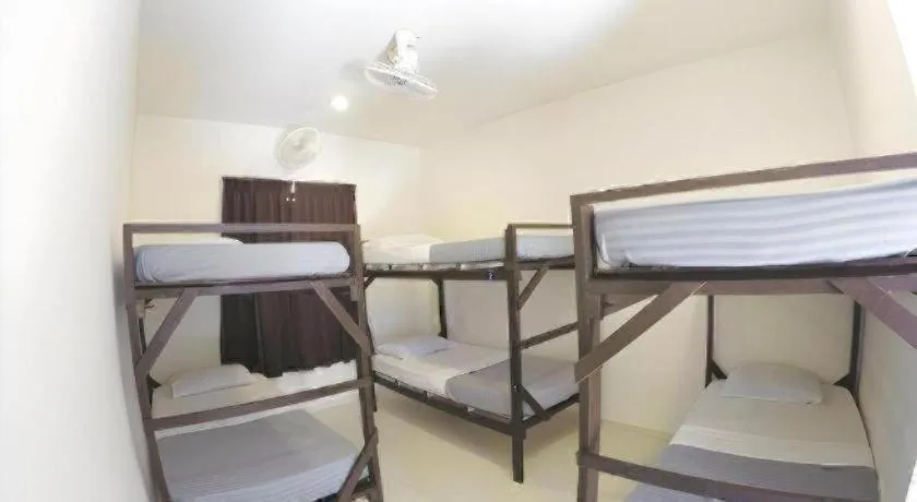 Bed in Perhentian Tivoli Inn