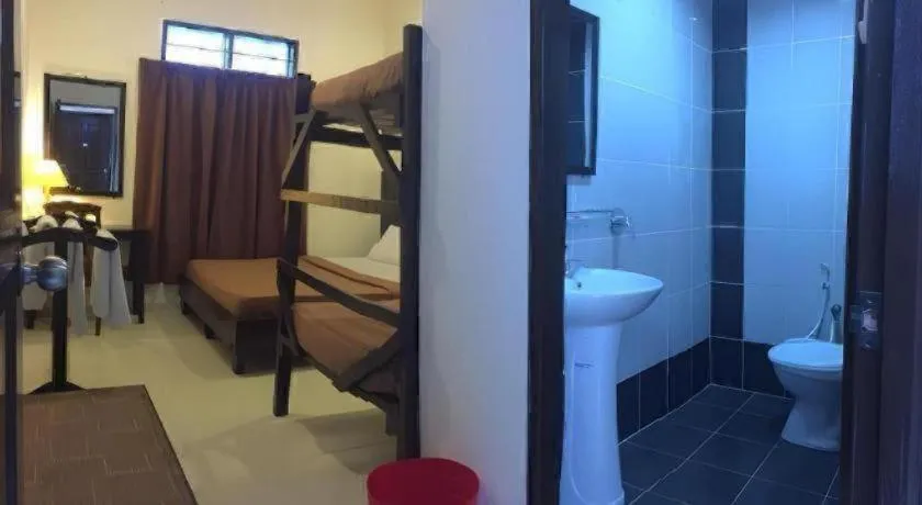 Bed in Perhentian Tivoli Inn