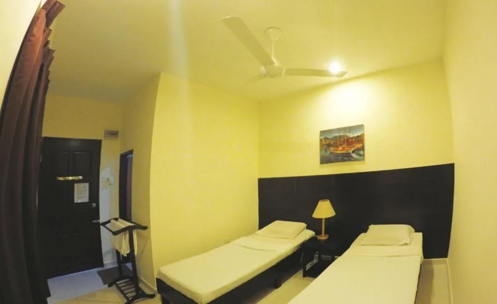 Bed in Perhentian Tivoli Inn