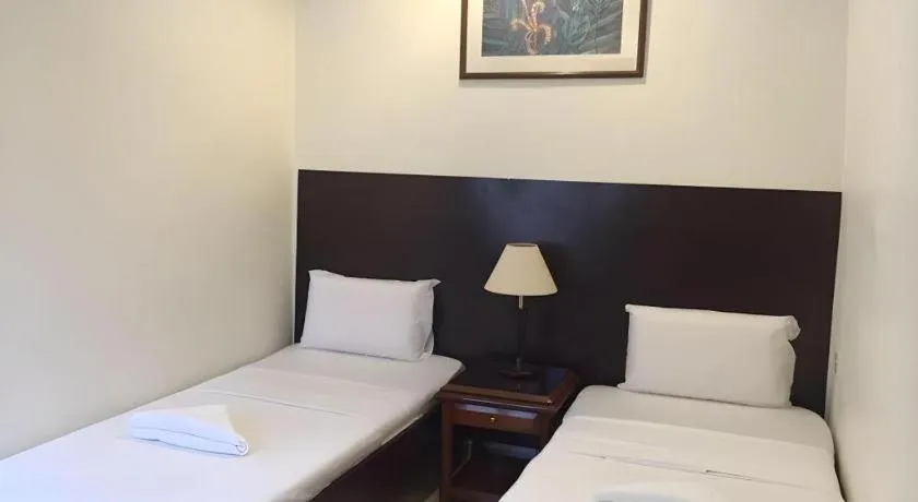 Bed in Perhentian Tivoli Inn