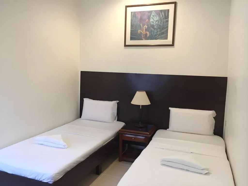 Bed in Perhentian Tivoli Inn