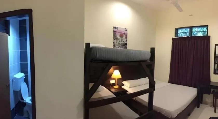 Bed in Perhentian Tivoli Inn