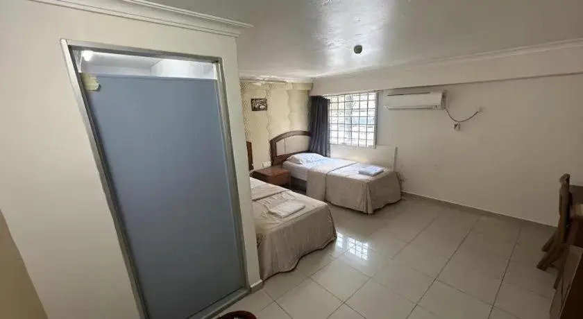 Bed in Angsa Hotel Bed in Angsa Hotel