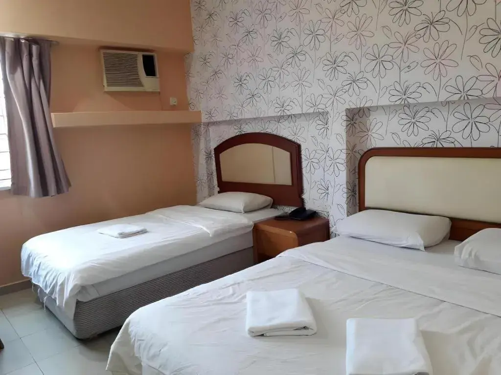 Bed in Angsa Hotel Bed in Angsa Hotel