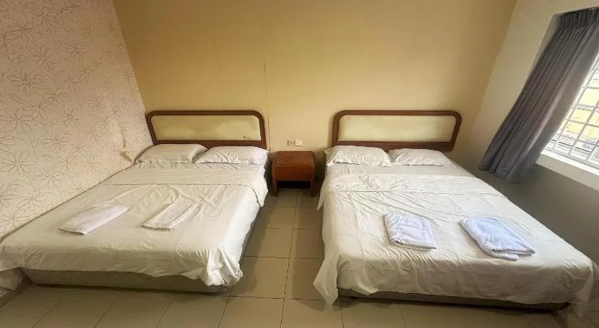 Bed in Angsa Hotel