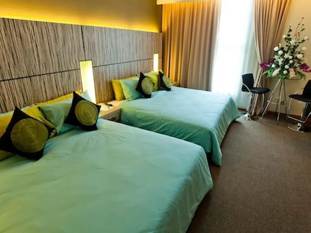 Bed in Grand Medallion Hotel Bed in Grand Medallion Hotel