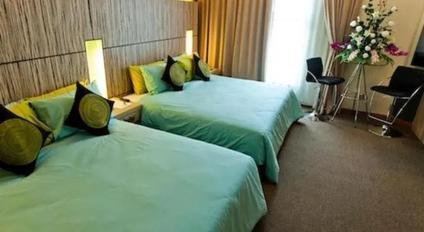 Bed in Grand Medallion Hotel Bed in Grand Medallion Hotel