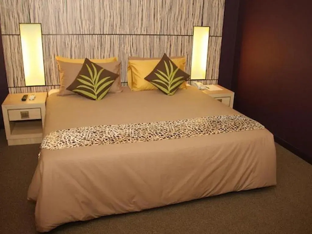 Bed in Grand Medallion Hotel Bed in Grand Medallion Hotel