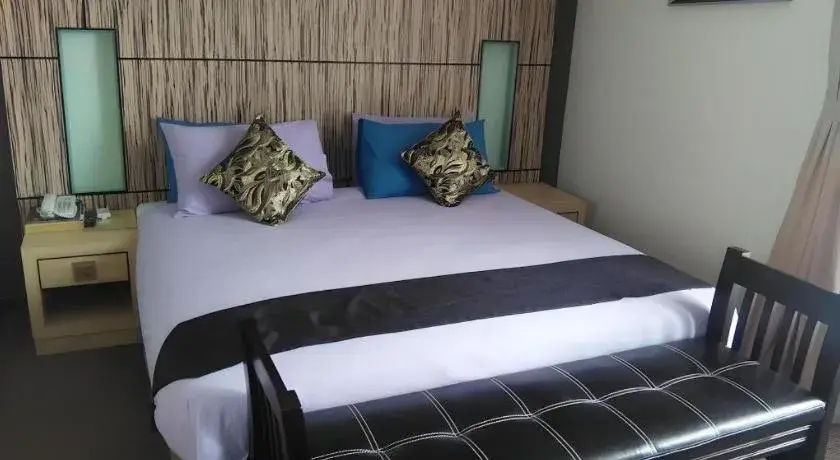 Bed in Grand Medallion Hotel Bed in Grand Medallion Hotel