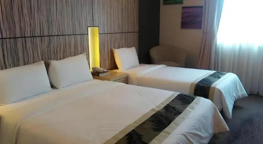 Bed in Grand Medallion Hotel Bed in Grand Medallion Hotel