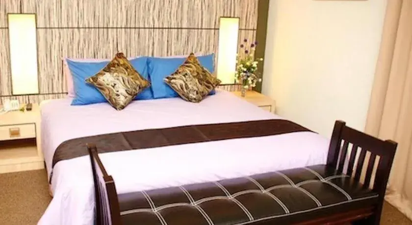 Bed in Grand Medallion Hotel Bed in Grand Medallion Hotel