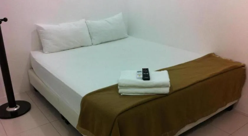 Bed in Chin Yee Hotel