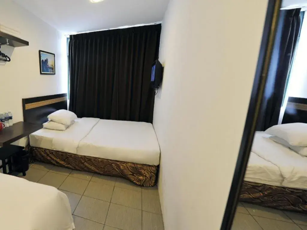 Bed in Place2Stay @ RH Plaza Hotel Bed in Place2Stay @ RH Plaza Hotel