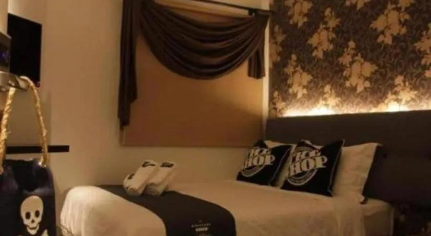 Bed in The Shop Hotel