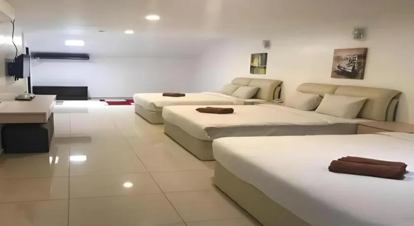 Bed in Peach Hill Hotel & Cafe