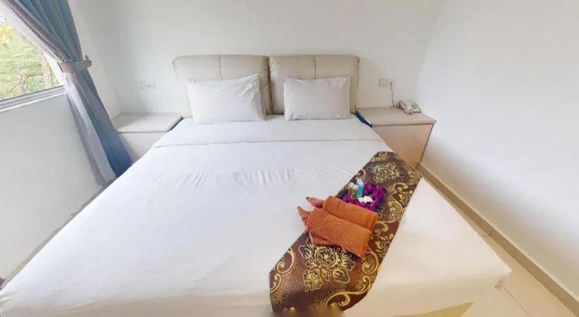 Bed in Peach Hill Hotel & Cafe