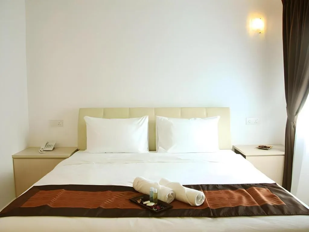 Bed in Peach Hill Hotel & Cafe