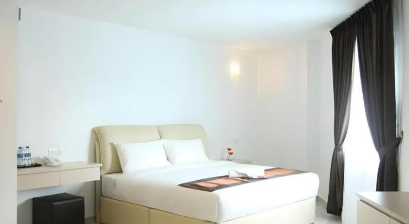 Bed in Peach Hill Hotel & Cafe