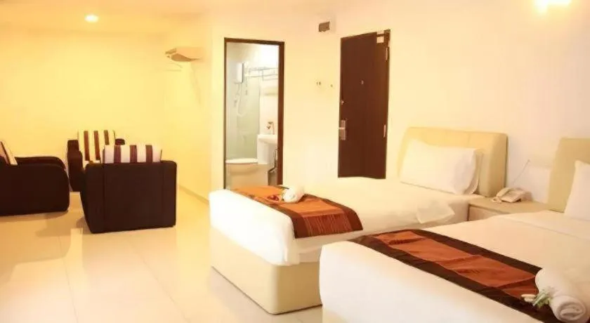 Bed in Peach Hill Hotel & Cafe