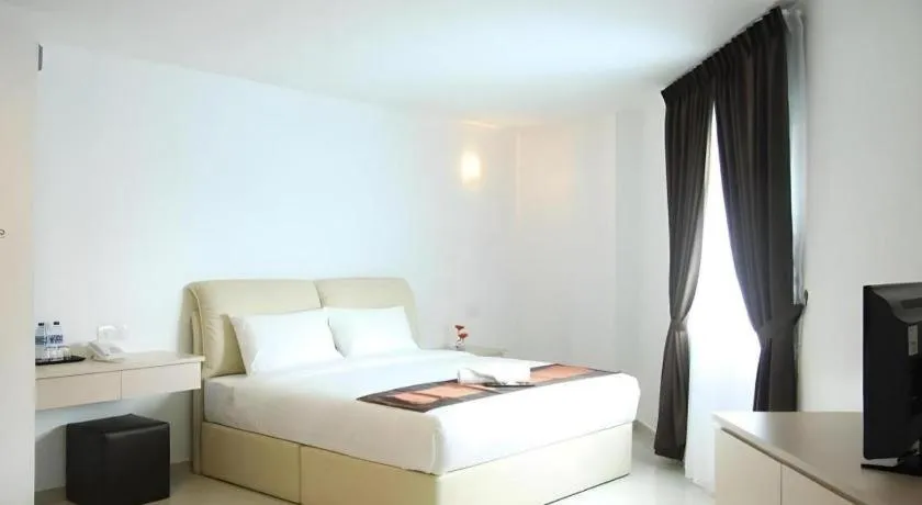 Bed in Peach Hill Hotel & Cafe