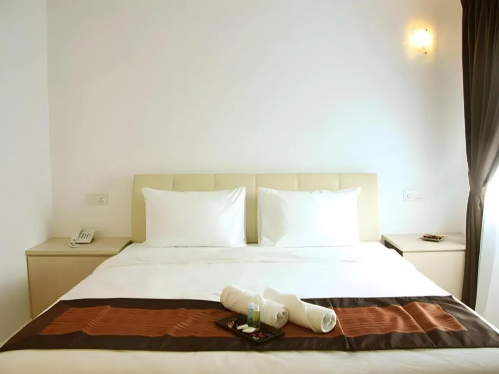 Bed in Peach Hill Hotel & Cafe