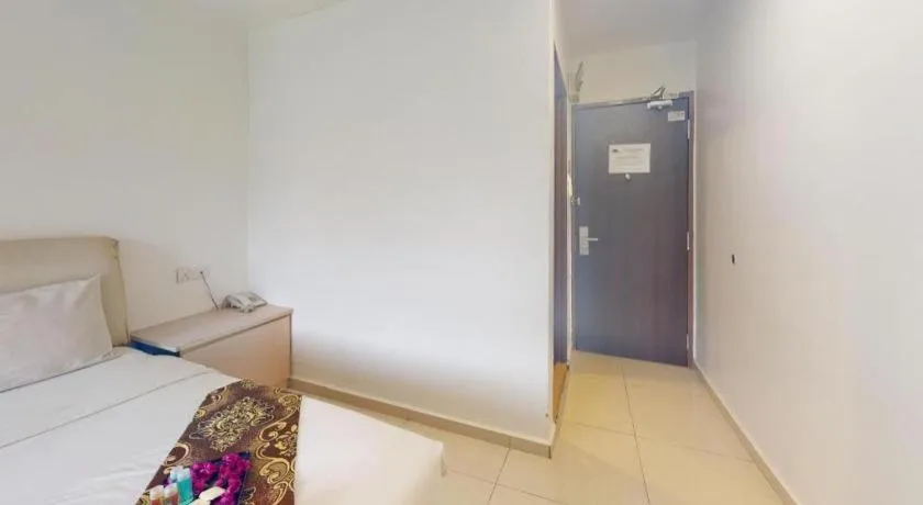 Bed in Peach Hill Hotel & Cafe