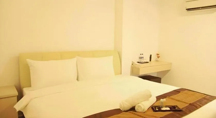 Bed in Peach Hill Hotel & Cafe