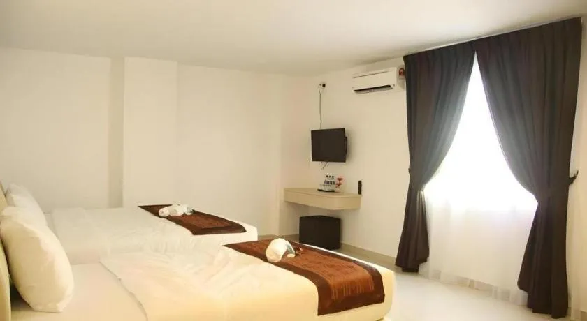 Bed in Peach Hill Hotel & Cafe