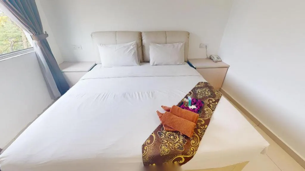 Bed in Peach Hill Hotel & Cafe