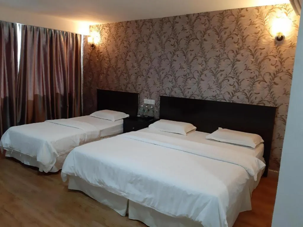 Bed in Loong Fatt Hotel