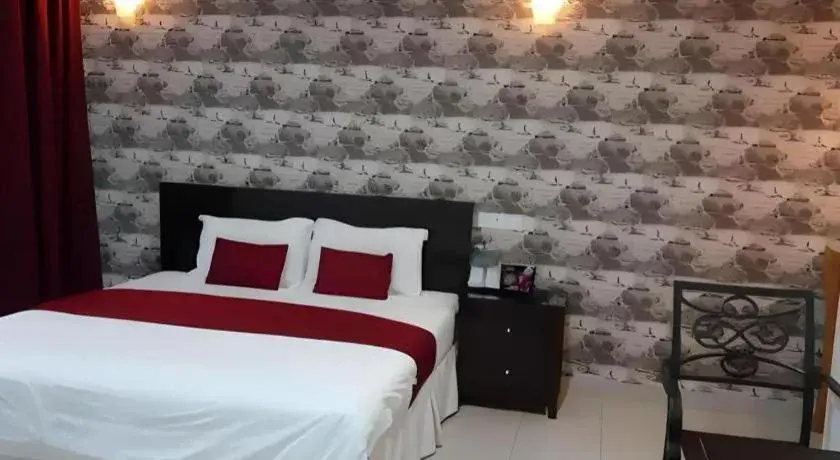 Bed in Loong Fatt Hotel Bed in Loong Fatt Hotel