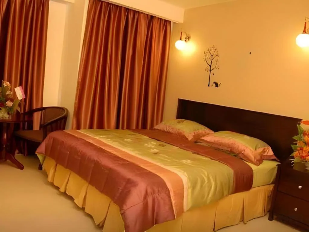 Bed in Loong Fatt Hotel